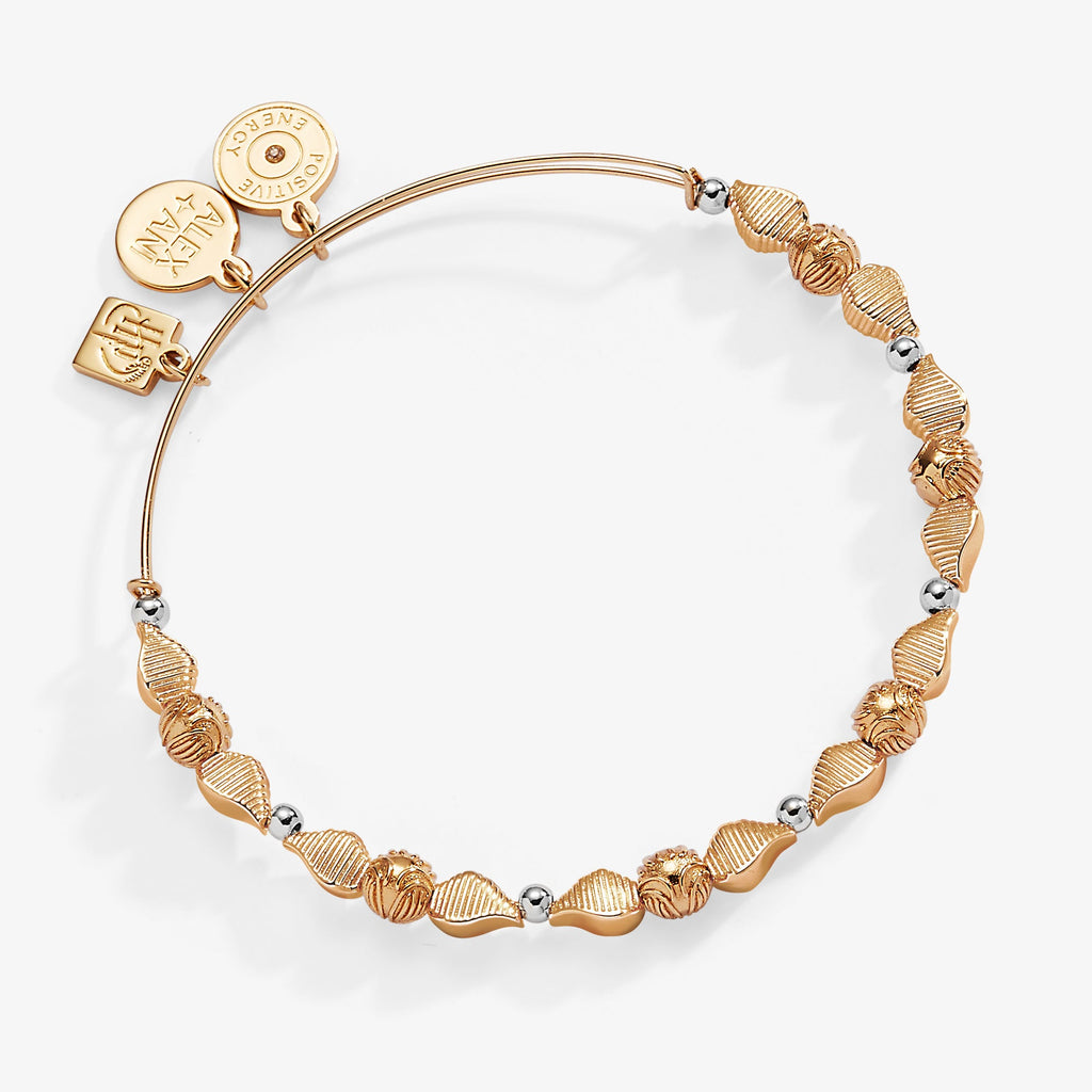 Harry Potter Golden Snitch Beaded Bangle with two-tone snitch charms and gold-tone beads.