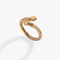 Gold-plated Harry Potter bypass ring featuring flame-shaped ends with sparkling jonquil crystals.