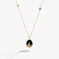 Gold-plated Hogwarts castle pendant necklace featuring a blue sunstone background and crystal accents.