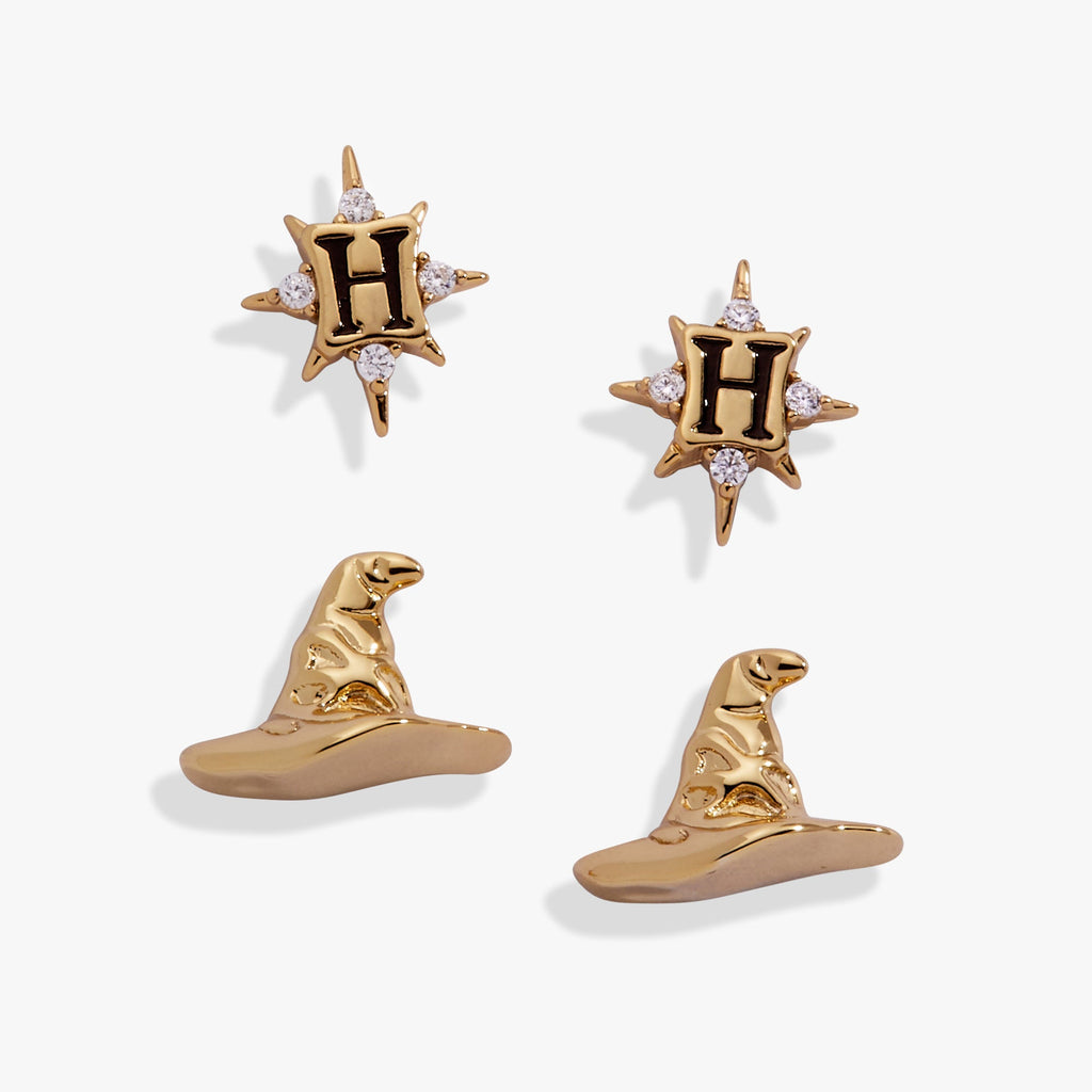 A pair of gold-plated Harry Potter stud earrings, one shaped as a 3D Sorting Hat and one as a crystal-adorned Hogwarts crest.