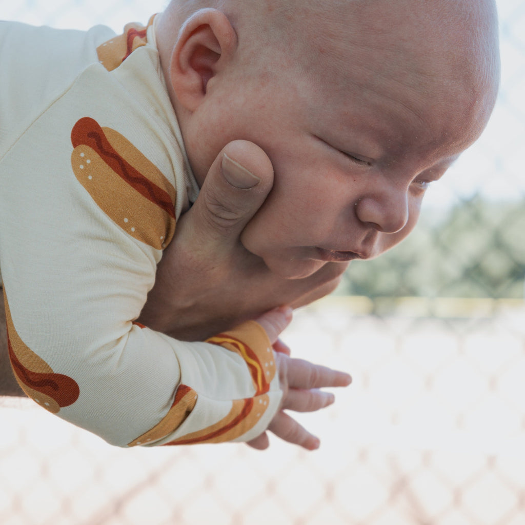 Bamboo Zip Pajamas for Babies in Hot Dogs Print - Cream & Red