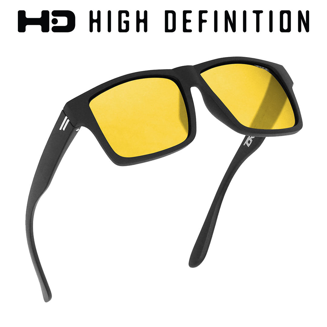 Pair of yellow-lens HD polarized night driving sunglasses with a durable black flex frame.