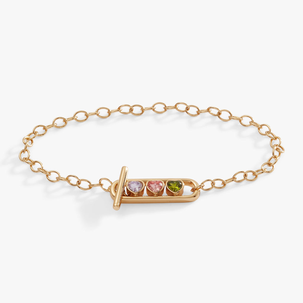 Heart Crystal Toggle Bracelet with purple, pink, and green heart-shaped stones on a chain.