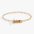 Heart Crystal Toggle Bracelet with purple, pink, and green heart-shaped stones on a chain.