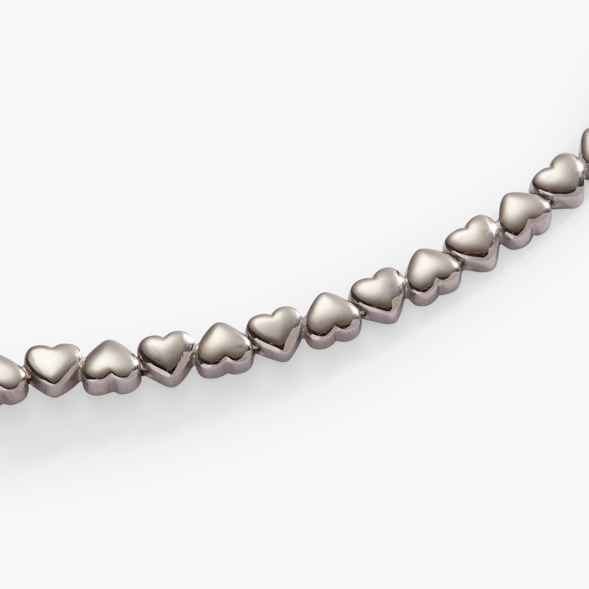 Heart Charm Tennis Bracelet in Silver-Tone Stainless Steel