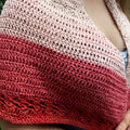 Herbal Sunrise Shawl crochet pattern with an ombré gradient from light pink to deep berry red.