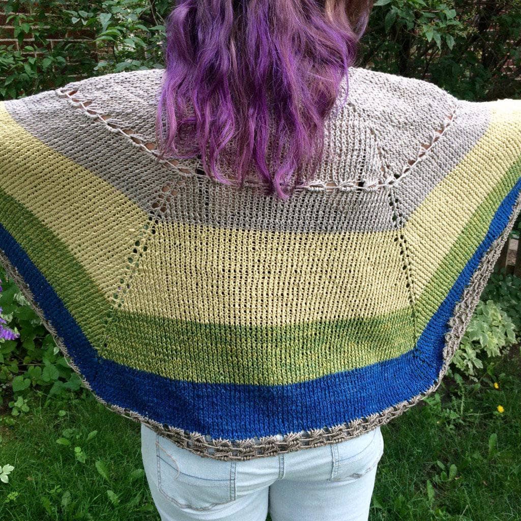 Herbal Sunrise Shawl knit kit featuring striped earth-toned silk yarn and knitting pattern.