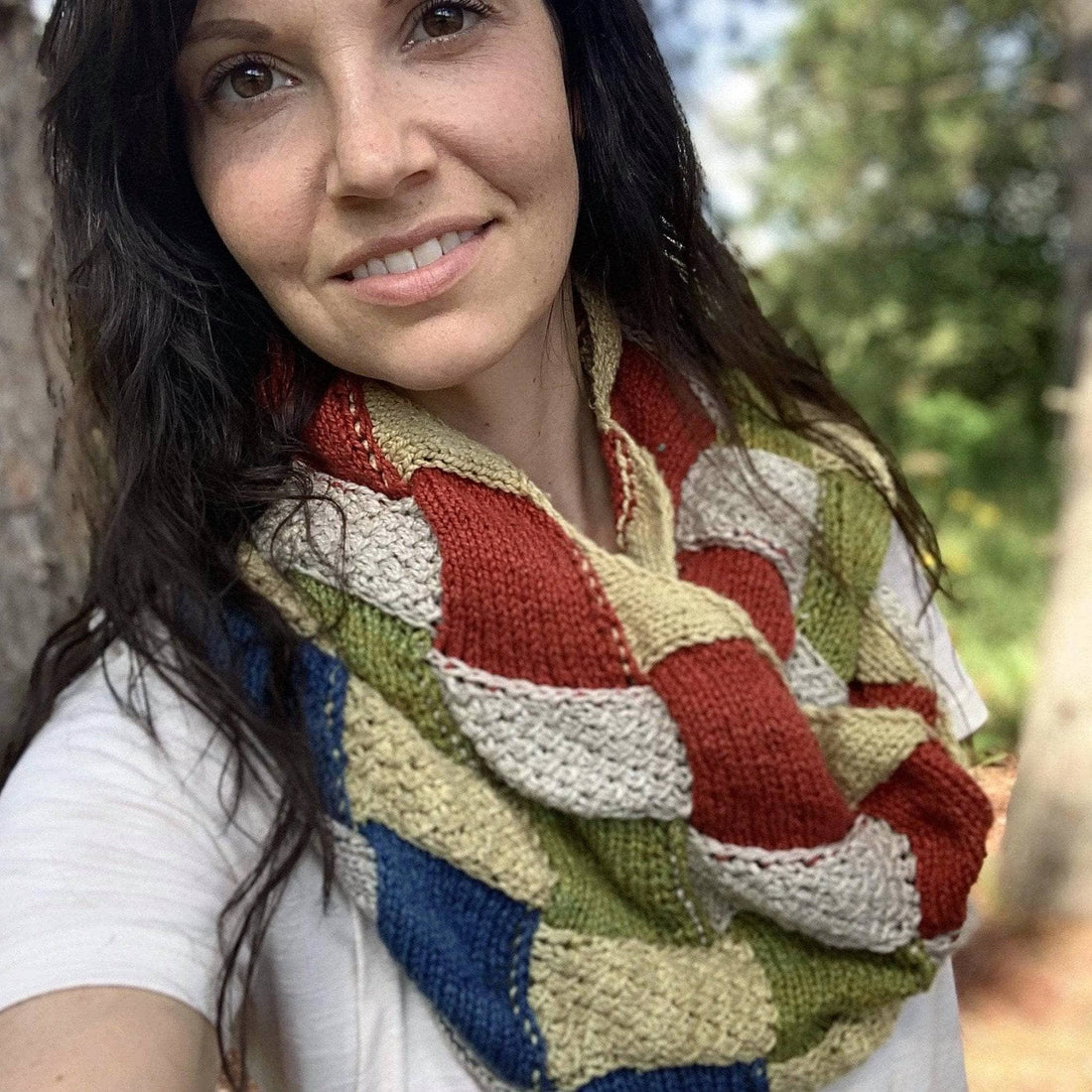 Close-up of a textured entrelac knit infinity scarf made from recycled silk yarn