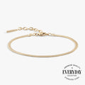 Minimalist herringbone chain bracelet in polished gold and silver finishes