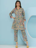 Model wearing a multi-color floral print cotton co-ord set with delicate embellishment details.