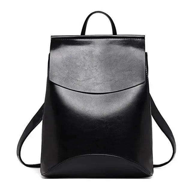 A minimalist leather backpack in solid color with anti-theft back zipper pocket.