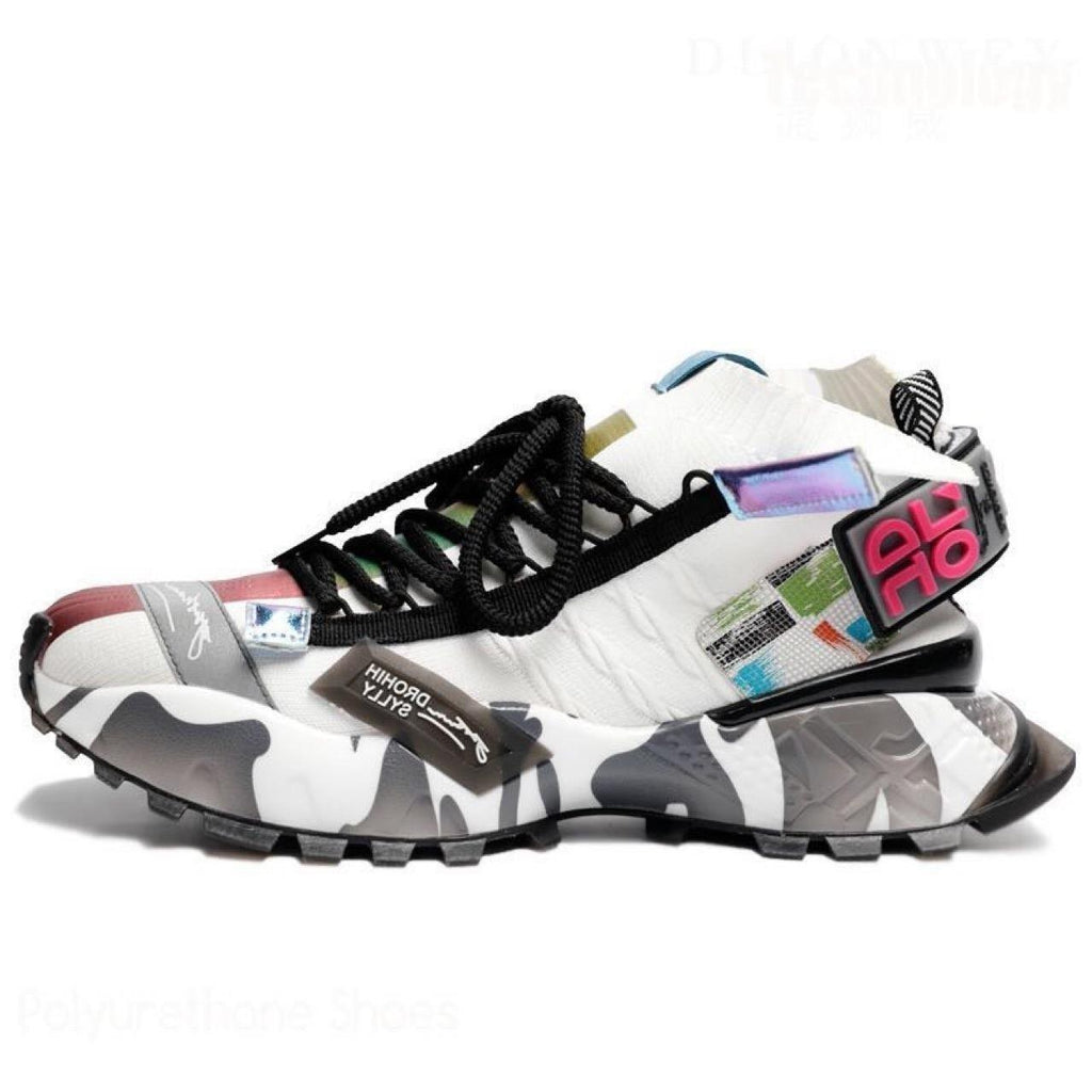 Men's chunky knit platform sneakers in black and white with abstract graphic accents and lace-up closure.