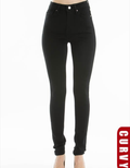 High rise black tapered denim jeans with zip-fly closure in a classic minimalist style.