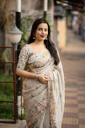 Grey pure linen saree with pencil stitch ethnic embroidery and matching phantom silk blouse