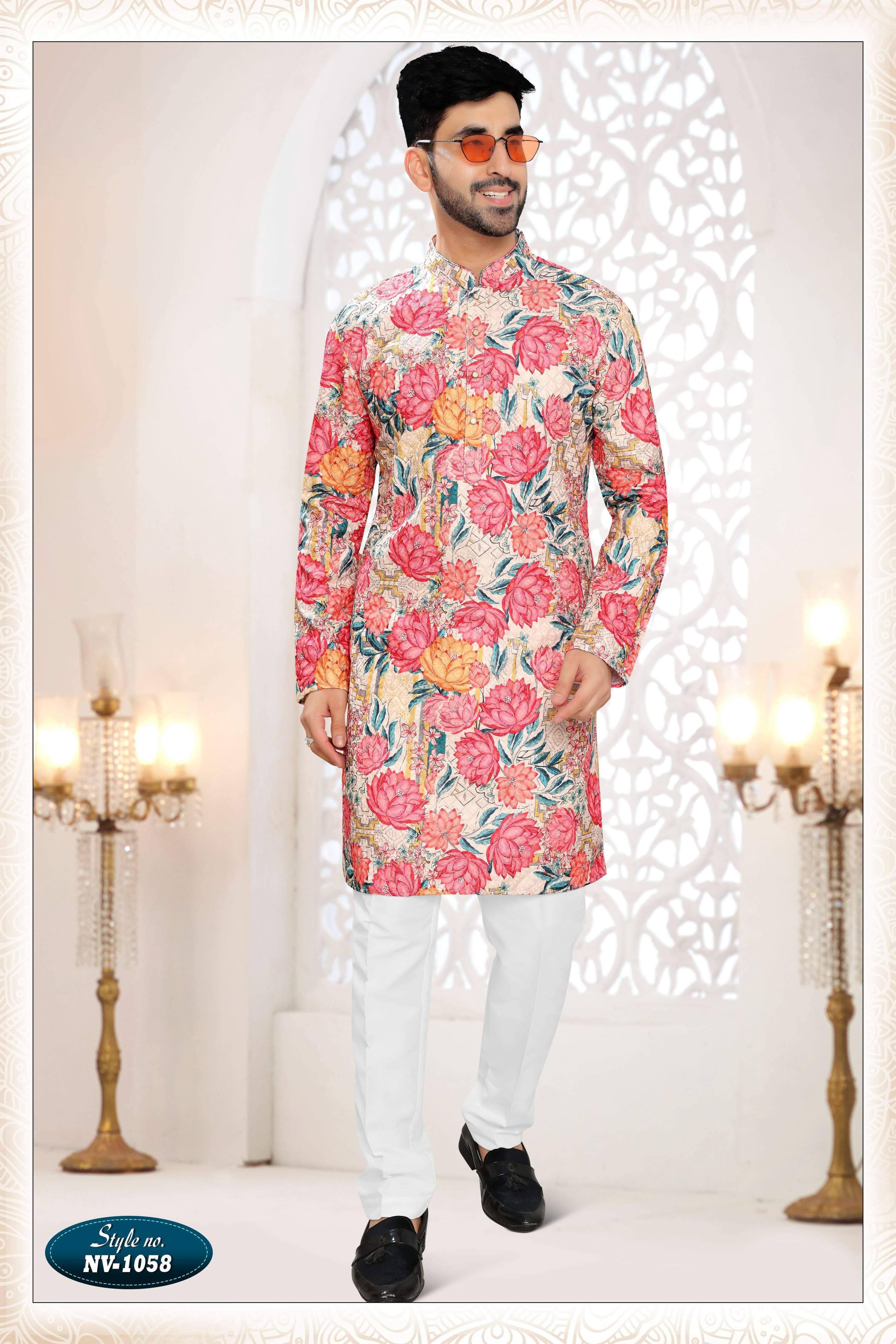 Men wearing a straight-cut cream silk kurta set with detailed thread and sequence embroidery
