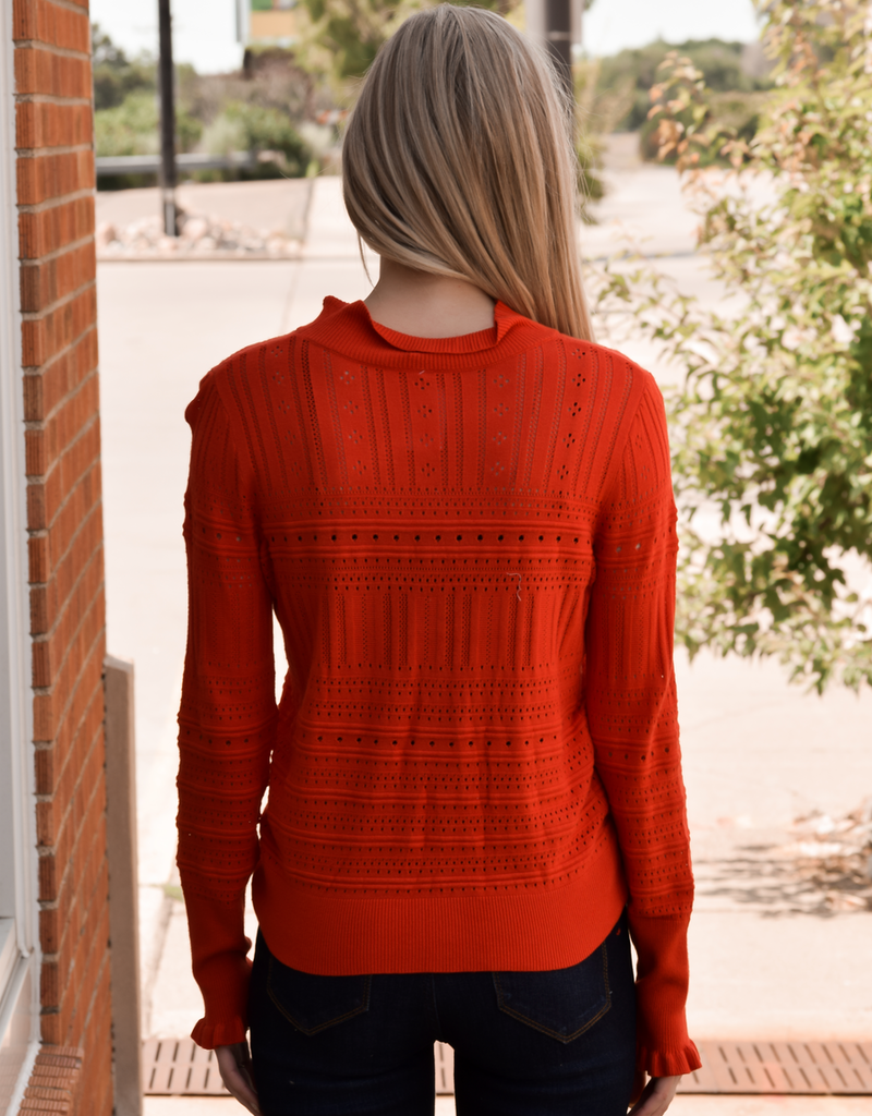 Hollow-Out Knitted Long Sleeve Top with Ruffle in Sunset Orange