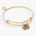 Alex And Ani Holly Jolly charm bangle with green and red enamel holly leaves and siam crystal berries.