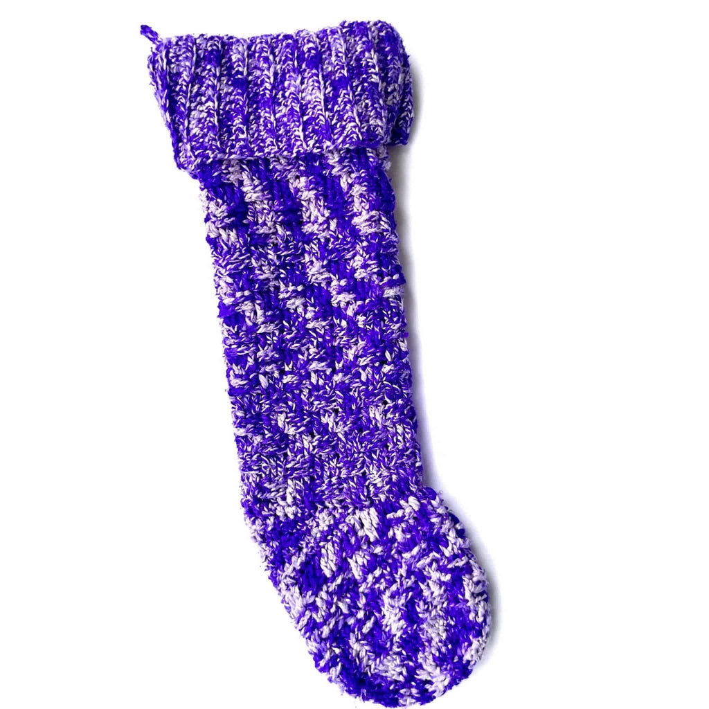 Handmade multi-colored purple and white knit Christmas stocking from the Holly Jolly Crochet Kit