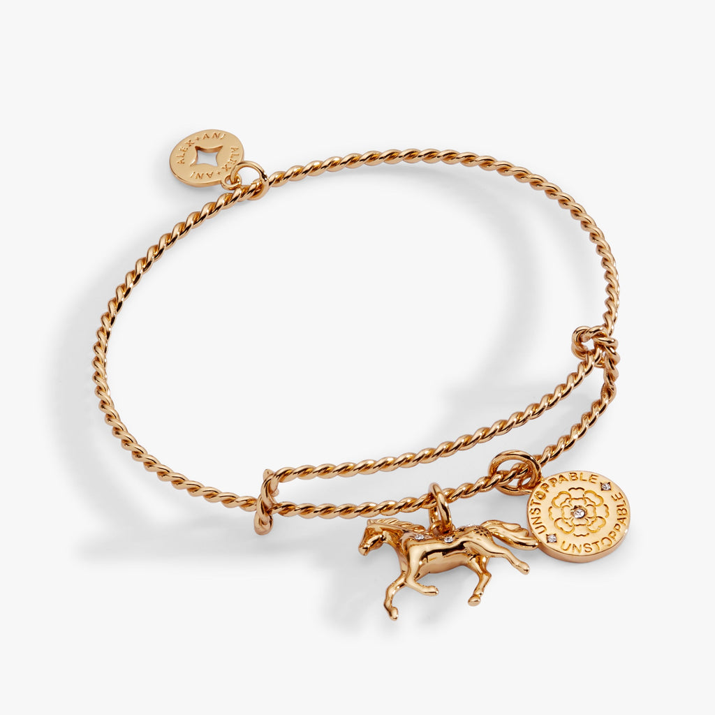 Gold or silver toned horse charm bangle with rope texture and crystal floral accents