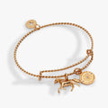 Gold or silver toned horse charm bangle with rope texture and crystal floral accents