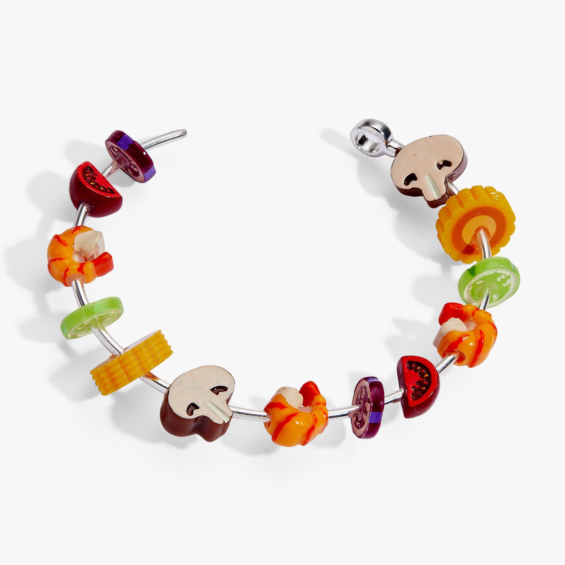 Silver cuff bracelet featuring colorful resin vegetable and shrimp charms designed for summer.