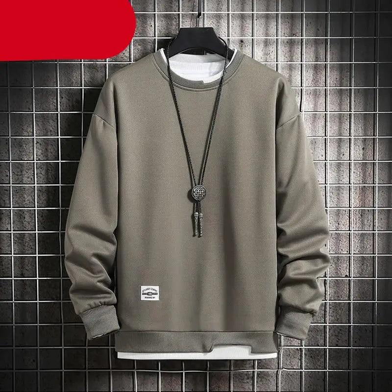 Men's minimalist solid color crew neck sweatshirt made of soft knit material.