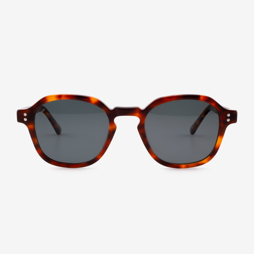 Hutchinson angular square sunglasses with keyhole bridge and stack rivet detail.