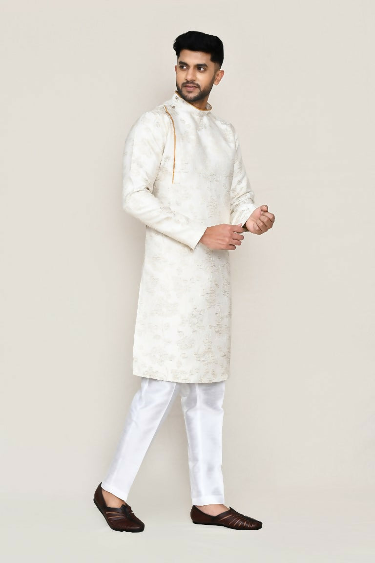 Cream colored jacquard silk kurta with matching straight fit trousers