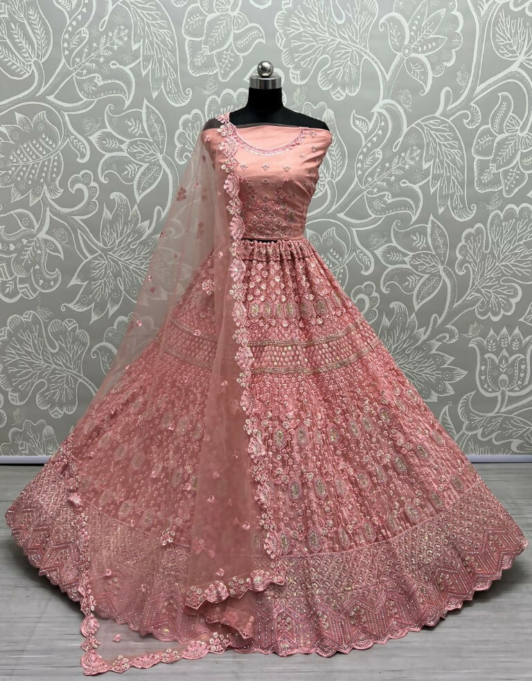 Pink heavy net lehenga with rainbow sequins and diamond work for festive weddings