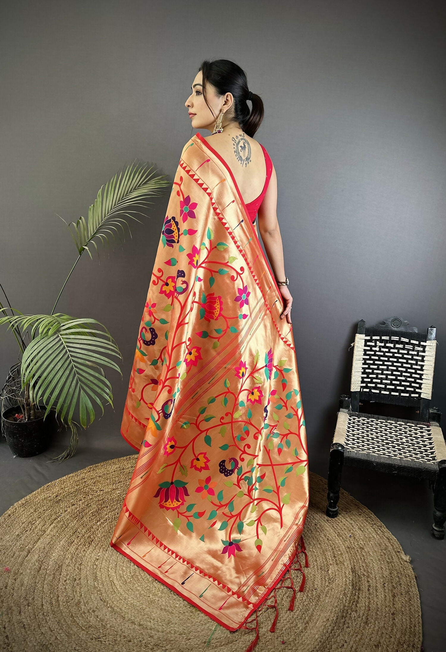 Reddish Pink Soft Silk Paithani Saree with Floral and Leaf Motifs