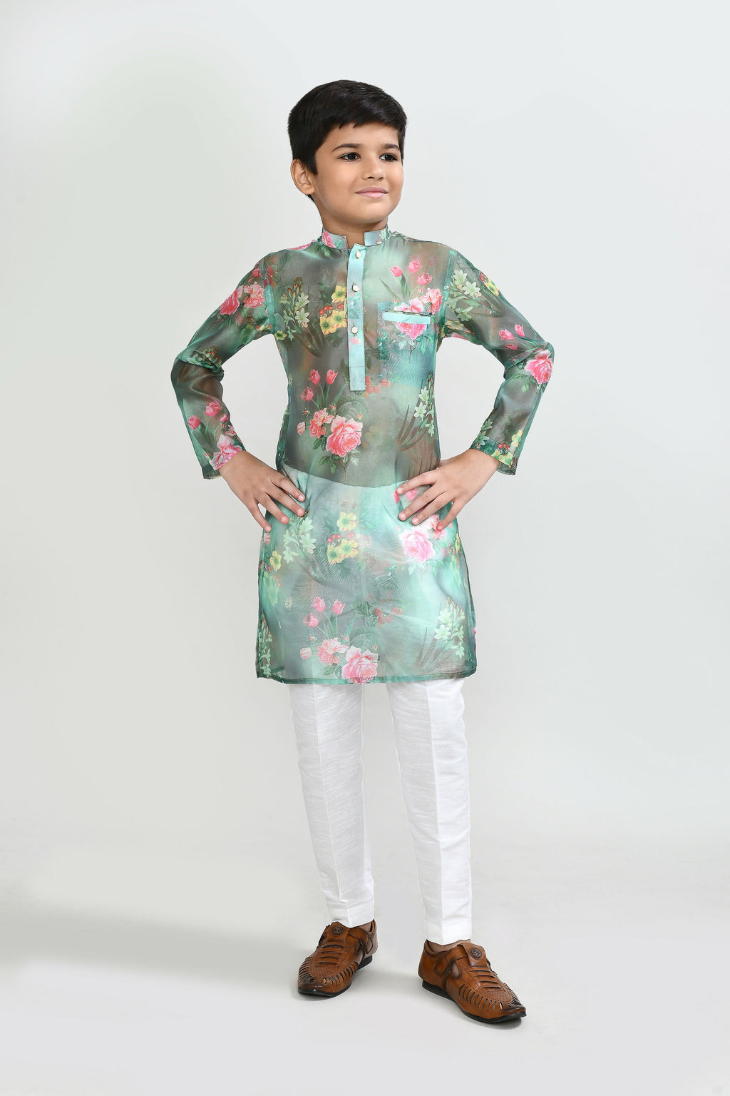 Kids floral green georgette kurta paired with white art silk straight fit pants