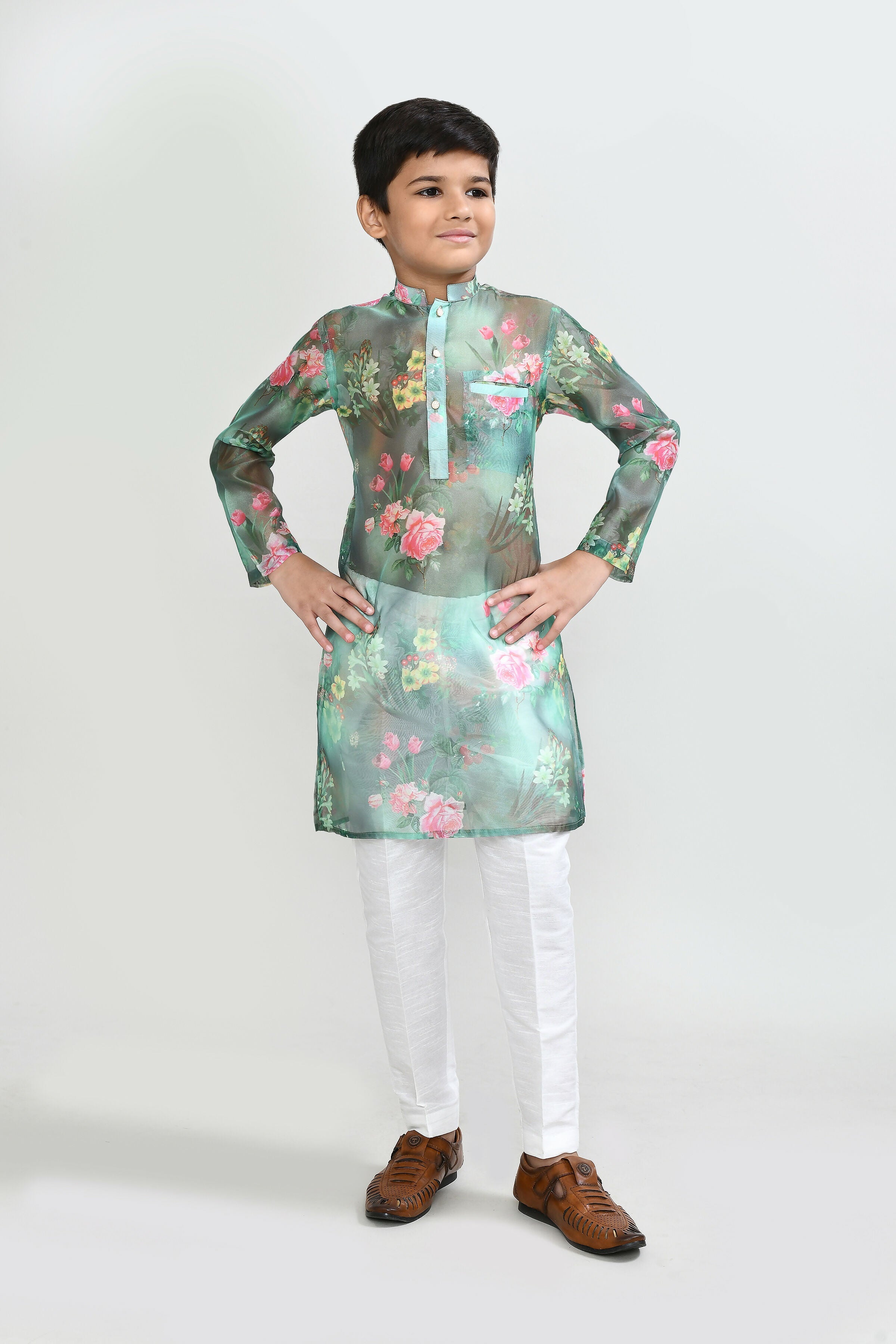 Kids floral green georgette kurta paired with white art silk straight fit pants