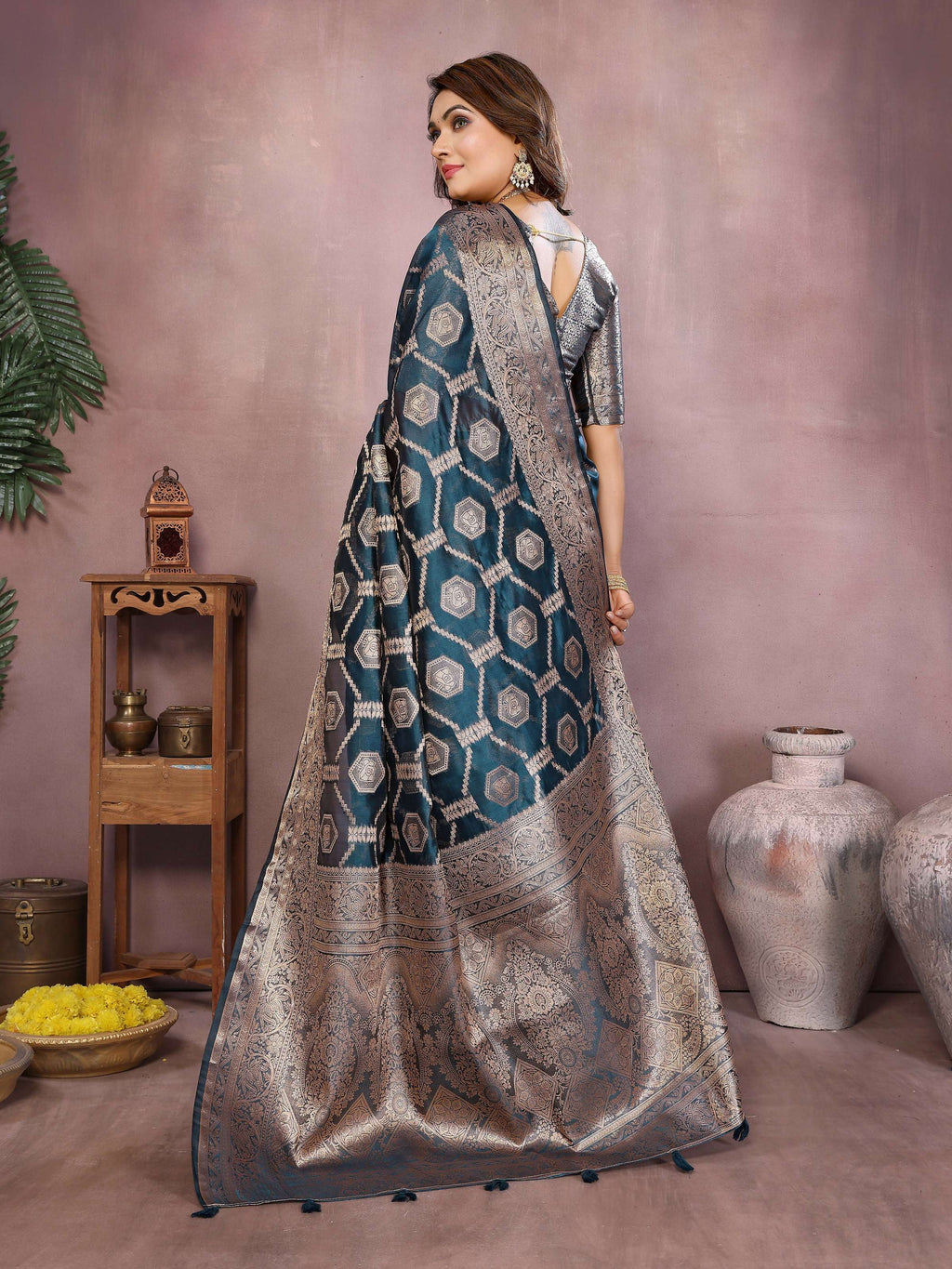 Teal Soft Organza Silk Saree with Intricate Weaving Detail