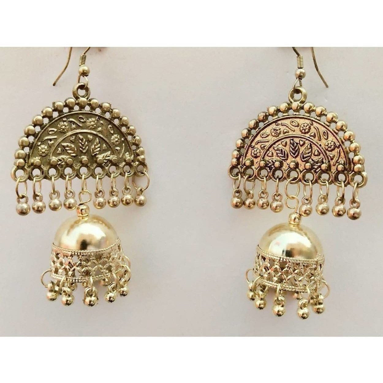 Gold-polished half moon jhumka earrings with pearl tassel drops