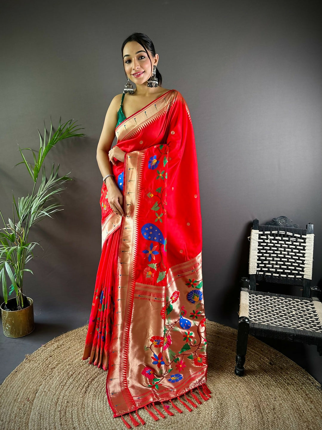 Green Paithani silk saree with intricate traditional motifs and unstitched blouse