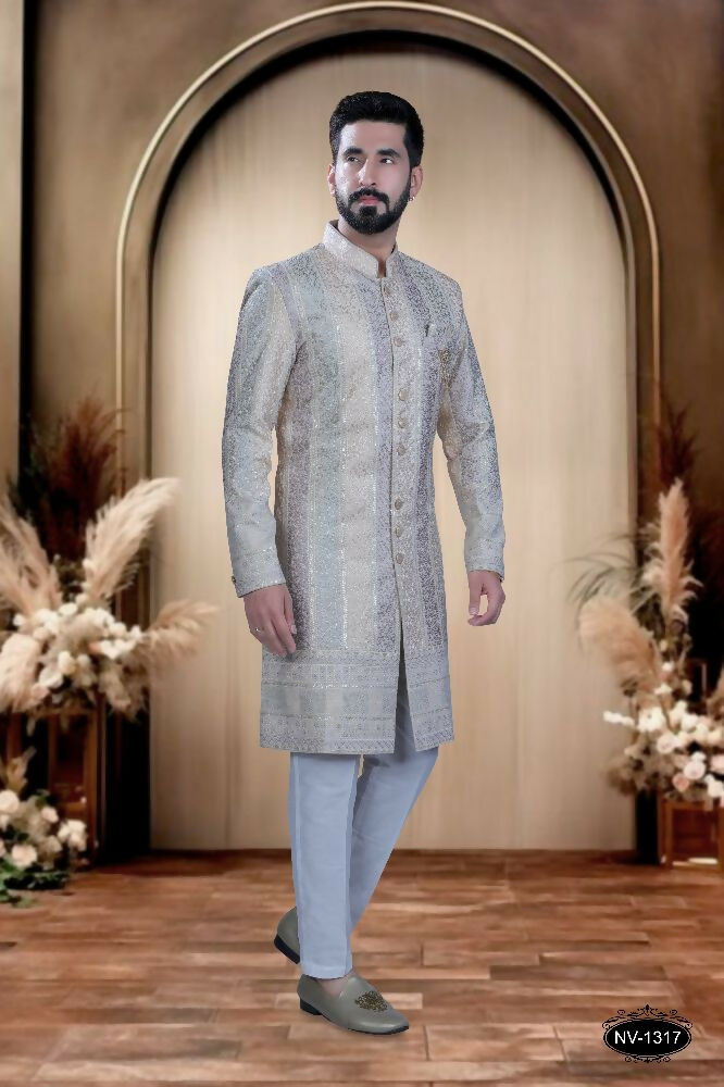 Boys cream velvet kurta with colorful embroidery and white pyjamas