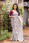 Grey pure linen ethnic saree with silver zari border and embroidered blouse