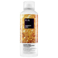 IGK Thirsty Girl Coconut Milk Leave-In Conditioner bottle in white and amber