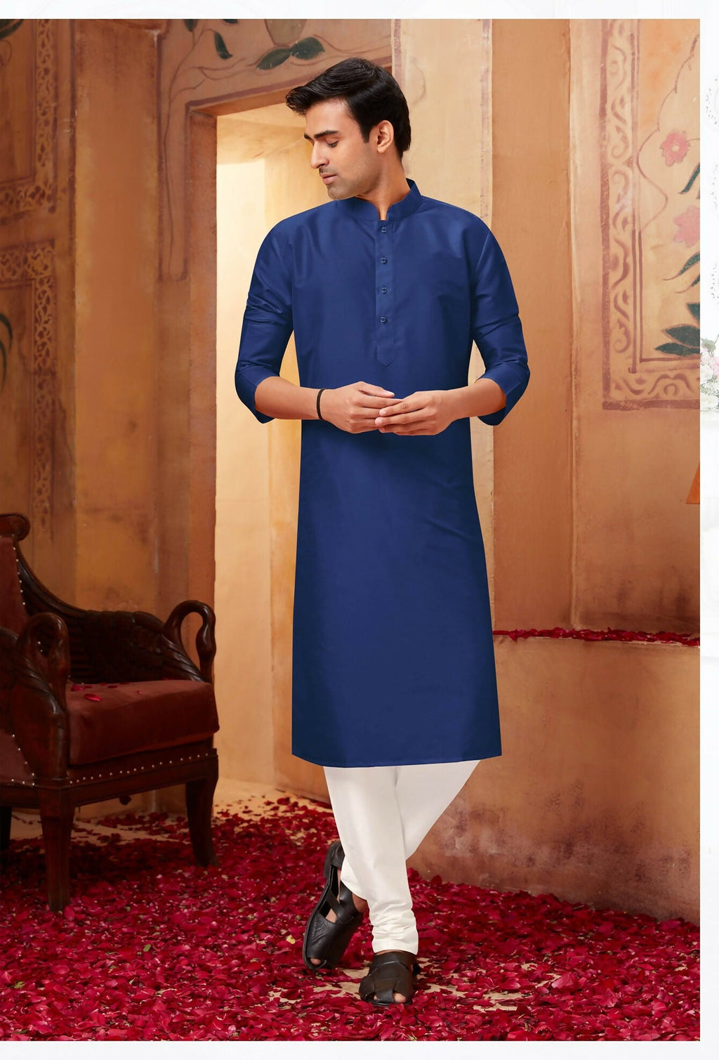 Smart navy blue art silk kurta with off-white pyjama trousers for a young boy
