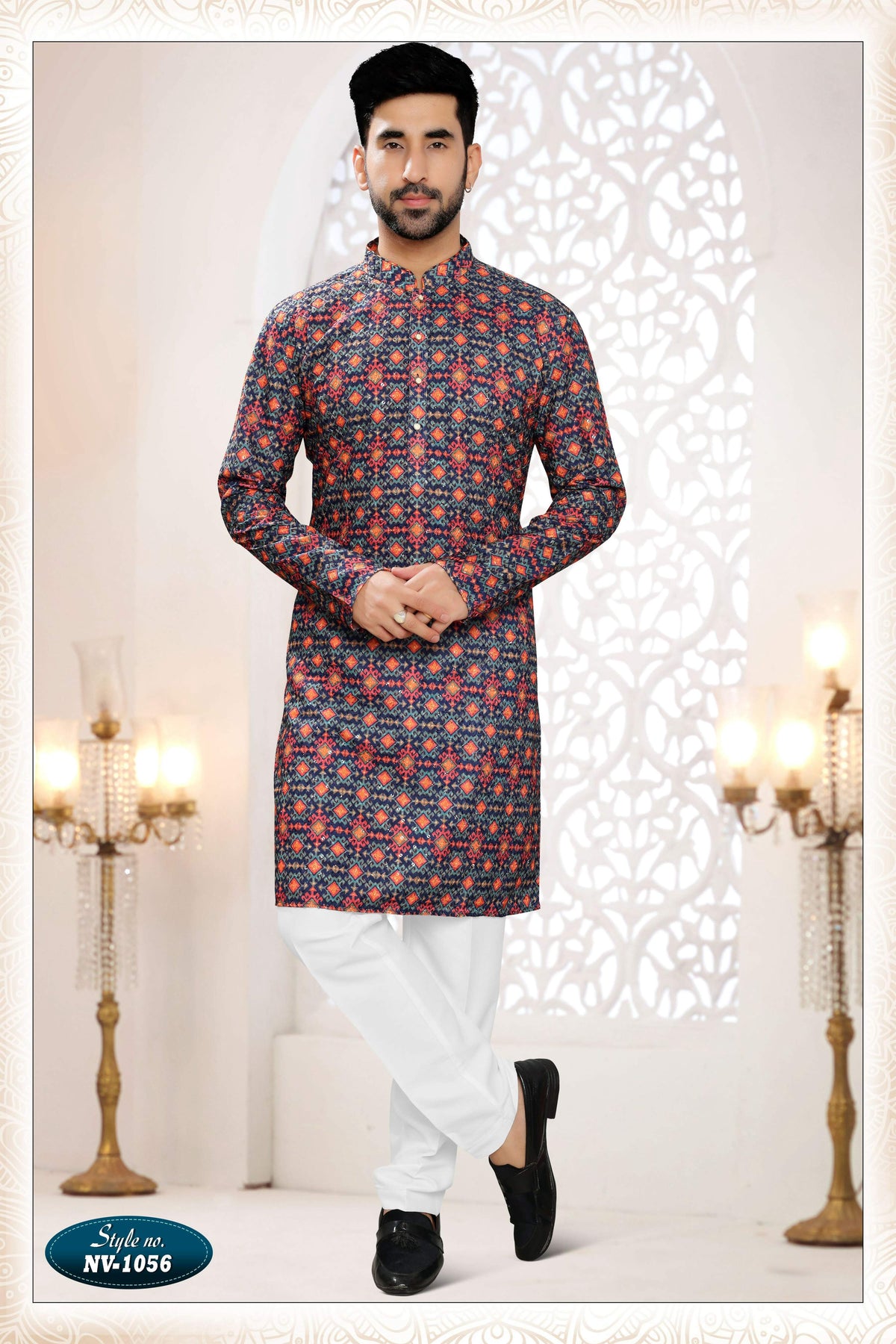 Men's blue straight rayon kurta with detailed thread and sequence embroidery.
