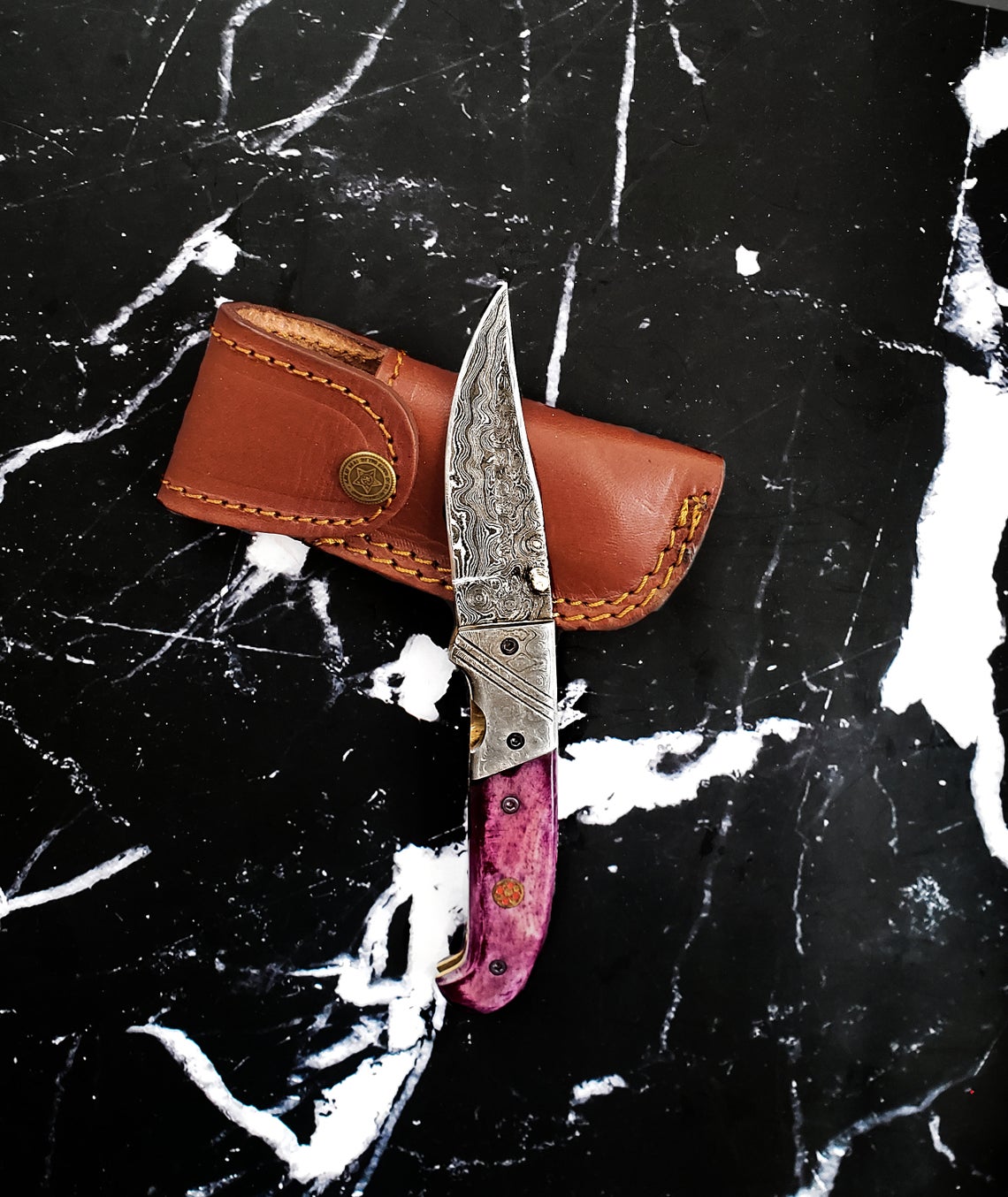 Classico Raindrop Damascus Folding Utility Knife with Walnut Scales