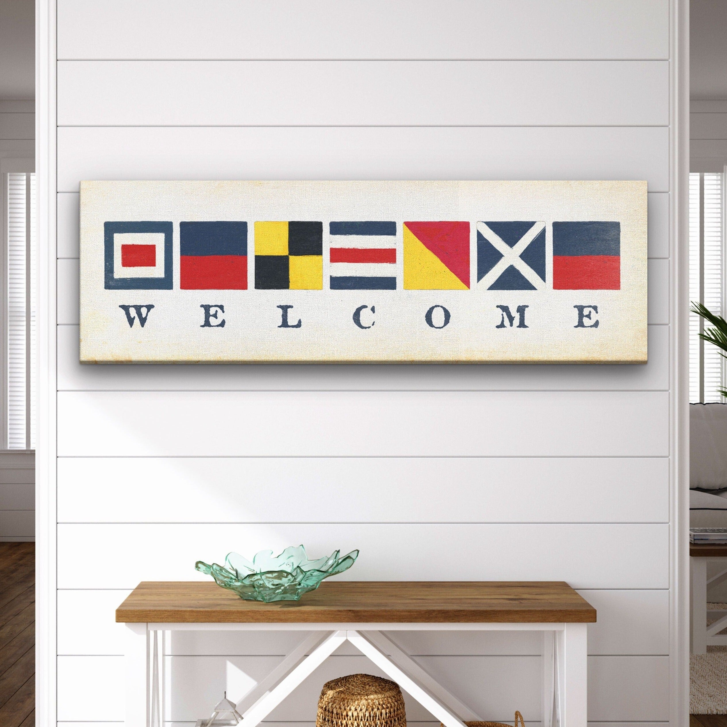 Nautical welcome sign featuring maritime signal flags on a vintage map background for coastal home wall decor
