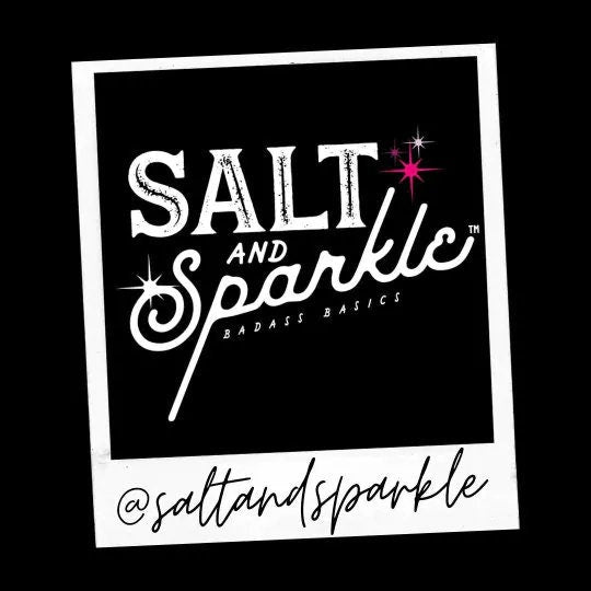 Salt and Sparkle logo with decorative elements on a black background