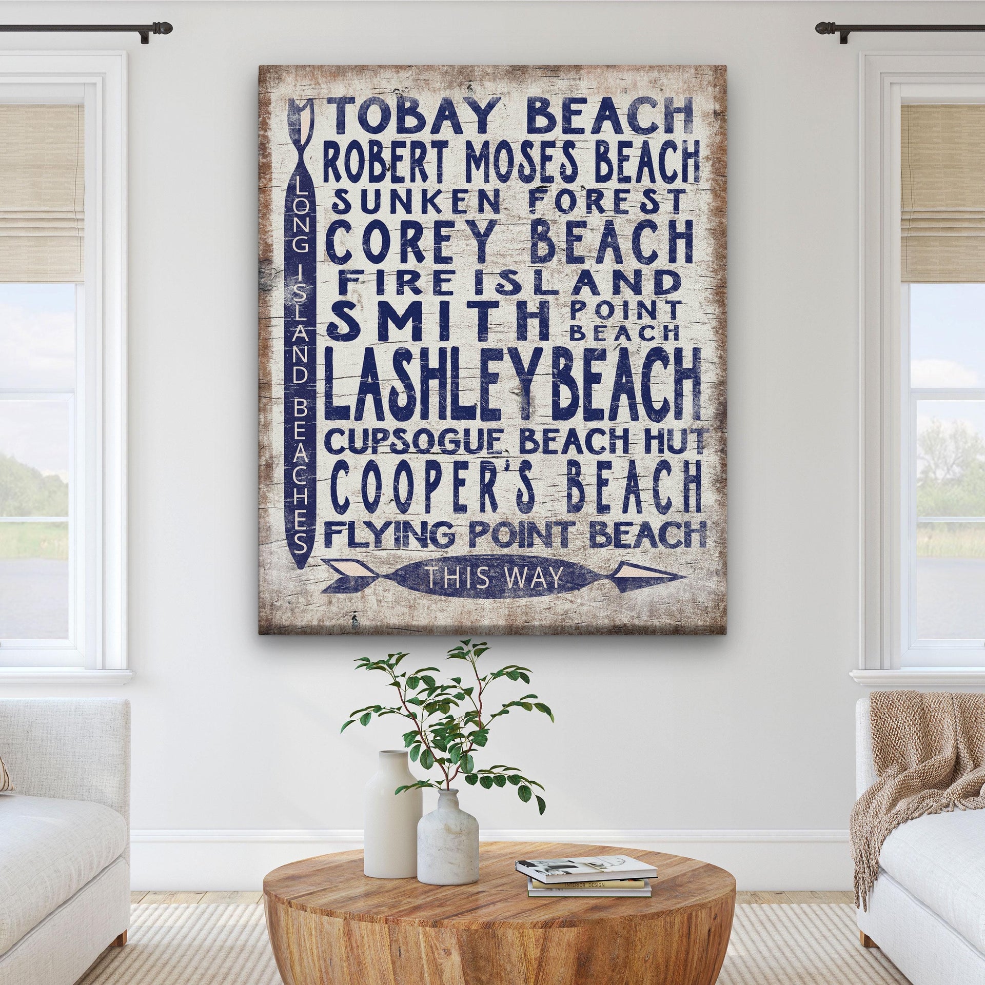 Vintage wood-look canvas arrow sign pointing to Long Island beaches like Montauk and Fire Island