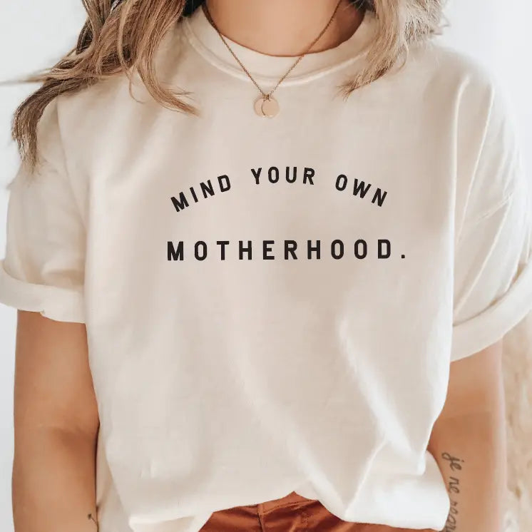 Mind Your Own Motherhood graphic crew neck in cream and black.