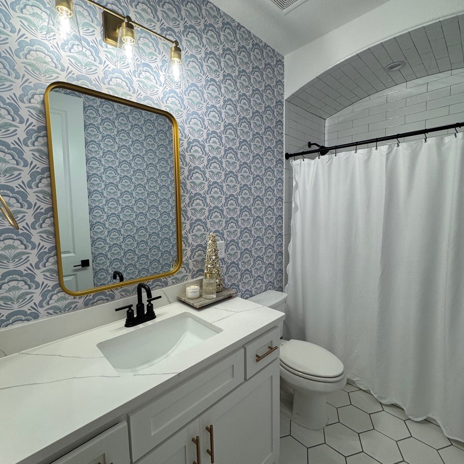 Brynn floral wallpaper with sage-green, blue, and white elements