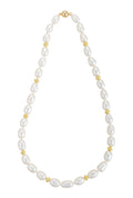Single strand baroque pearl necklace with gold plated beads on a white background