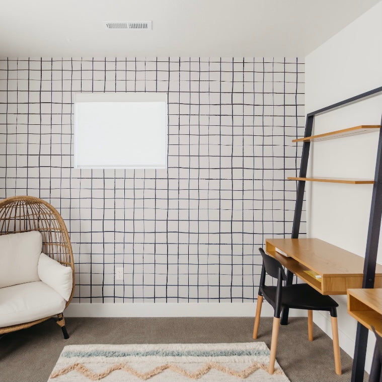 Asher geometric pattern wallpaper in modern white and black.