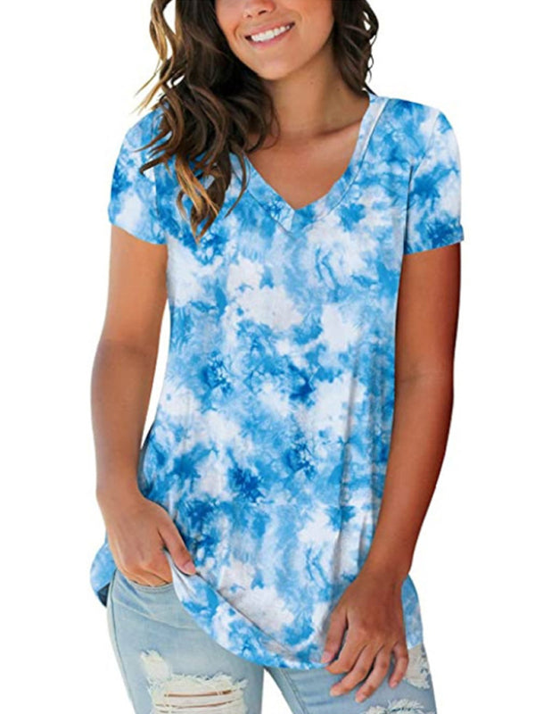 Woman wearing a vibrant blue tie dye V-neck short sleeve t-shirt
