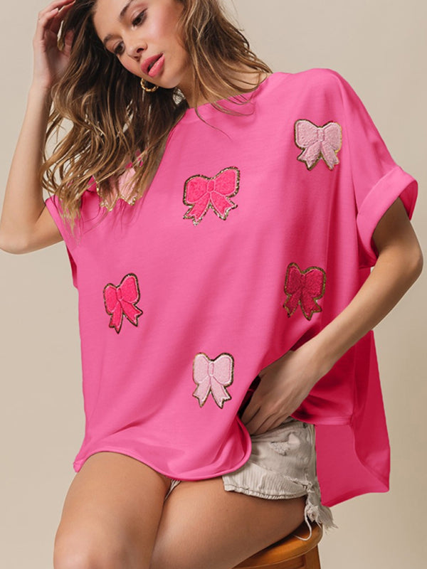 White Short-Sleeve Top with Embroidered Pink Sequin Bow Details - Image 6